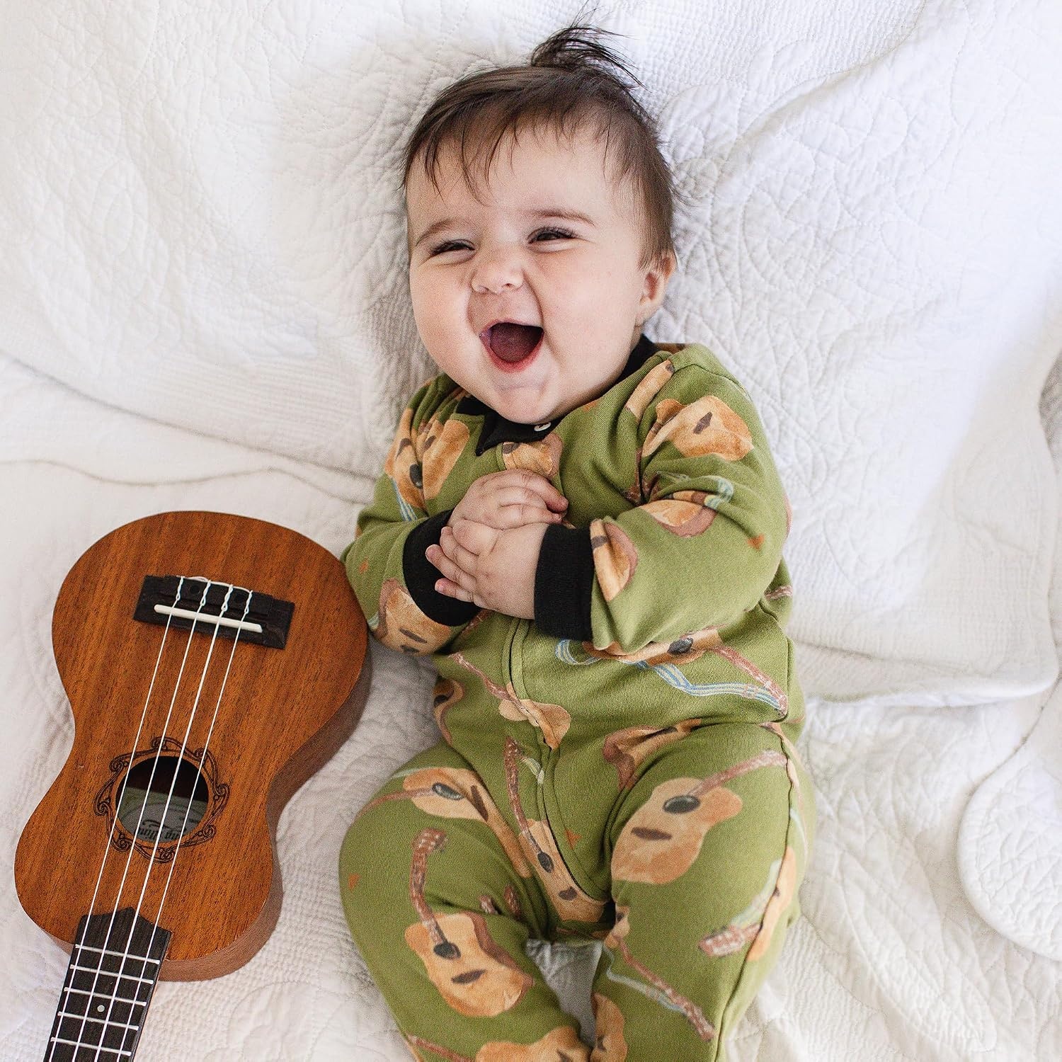 image:imageBurts Bees Baby Organic Cotton Sleep and Play Footed Pajamas for BoysAcoustic Guitar