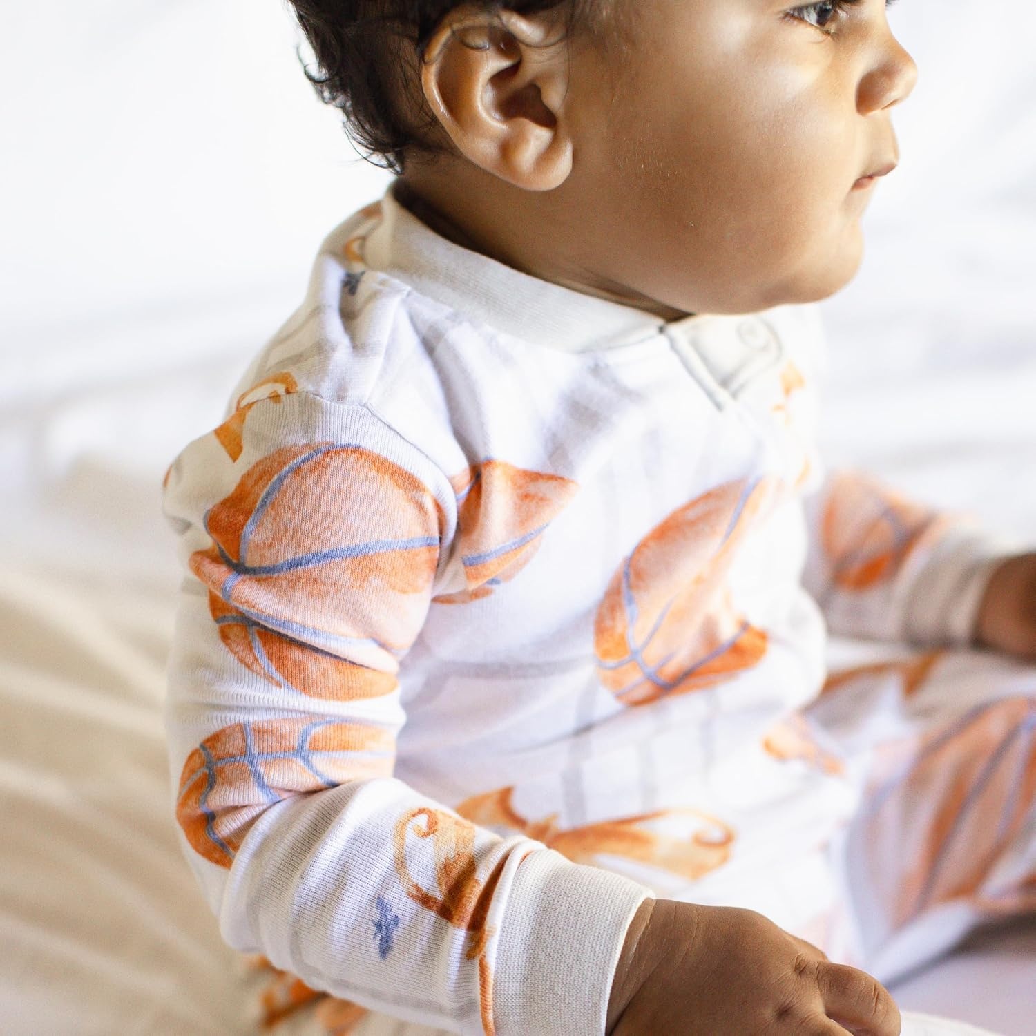 image:imageBurts Bees Baby Organic Cotton Sleep and Play Footed Pajamas for BoysBasketball Court