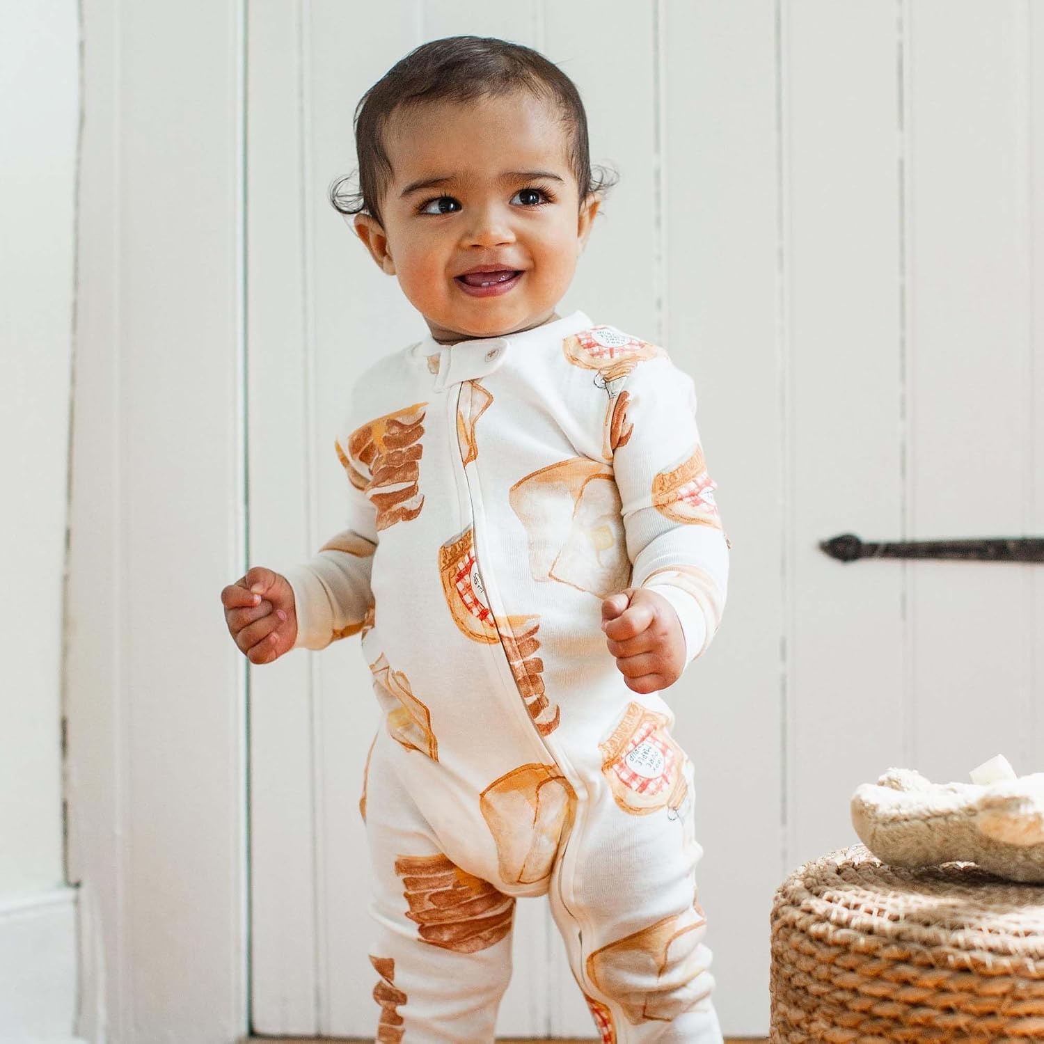 image:imageBurts Bees Baby Organic Cotton Sleep and Play Footed Pajamas for BoysFrench Toast