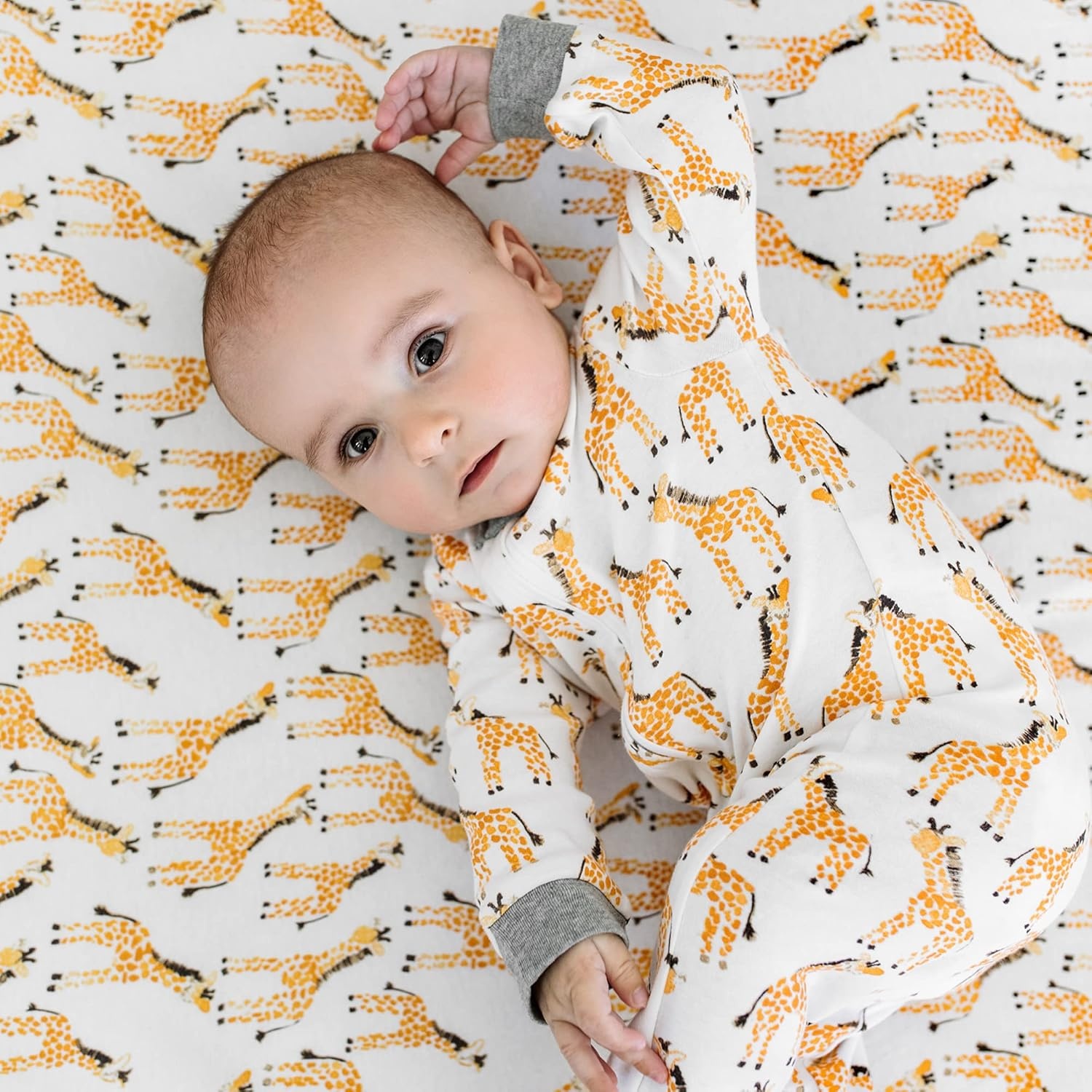 image:imageBurts Bees Baby Organic Cotton Sleep and Play Footed Pajamas for BoysGiraffe