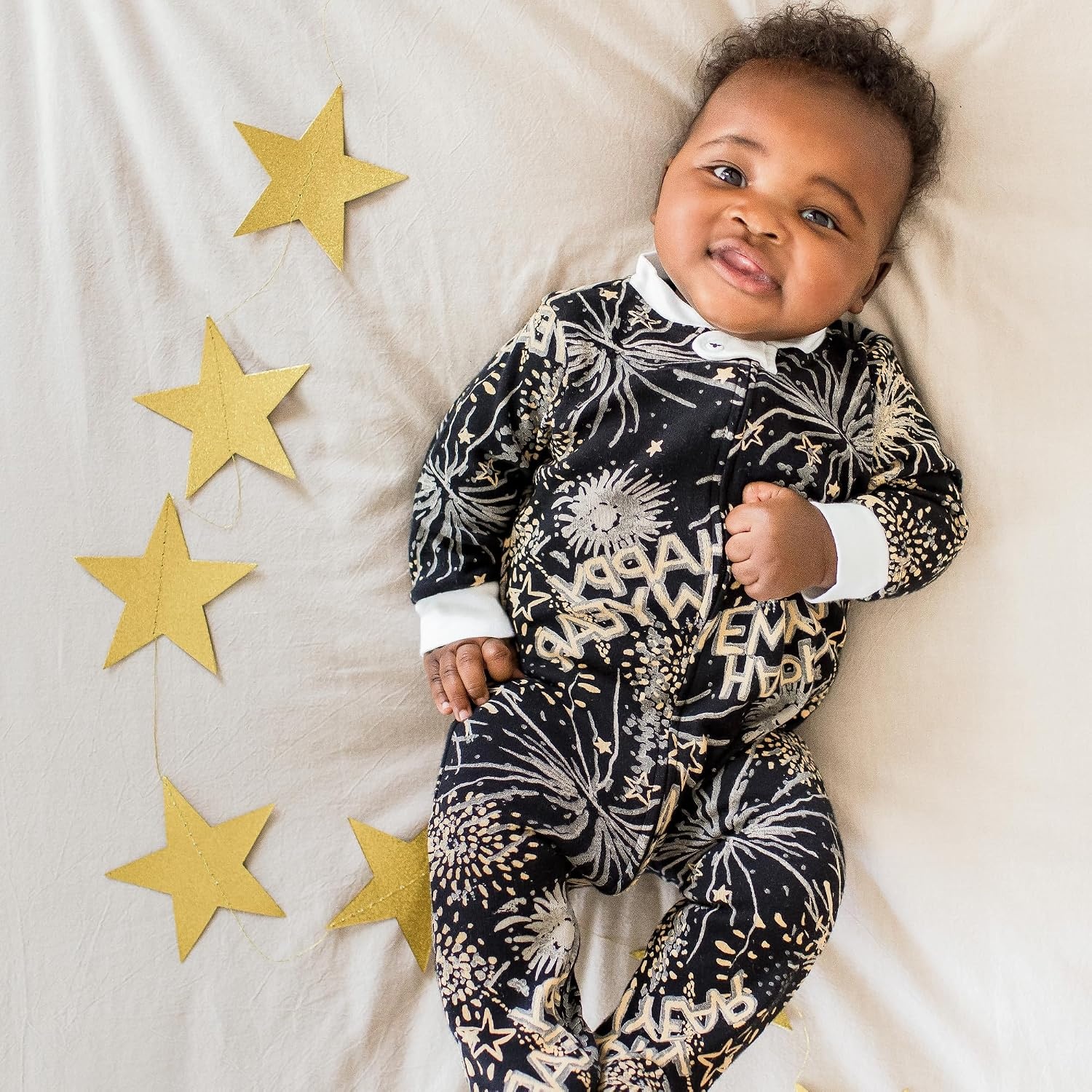 image:imageBurts Bees Baby Organic Cotton Sleep and Play Footed Pajamas for BoysNew Year Cheer