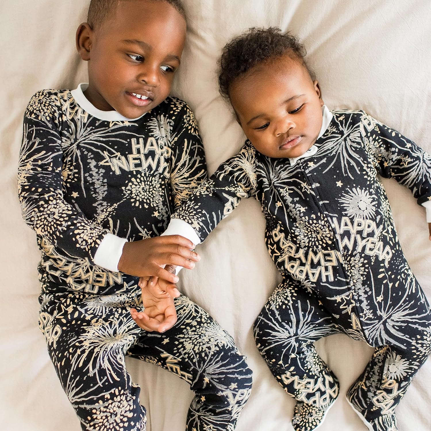 image:imageBurts Bees Baby Organic Cotton Sleep and Play Footed Pajamas for BoysNew Year Cheer