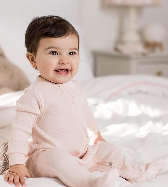image:imageBurts Bees Baby Girls Organic Cotton Sleep and Play Footed Pajamas Easy zip front PJs feature a 2way zipper to ensure newborns have a restful nights sleepPink Solid Rib